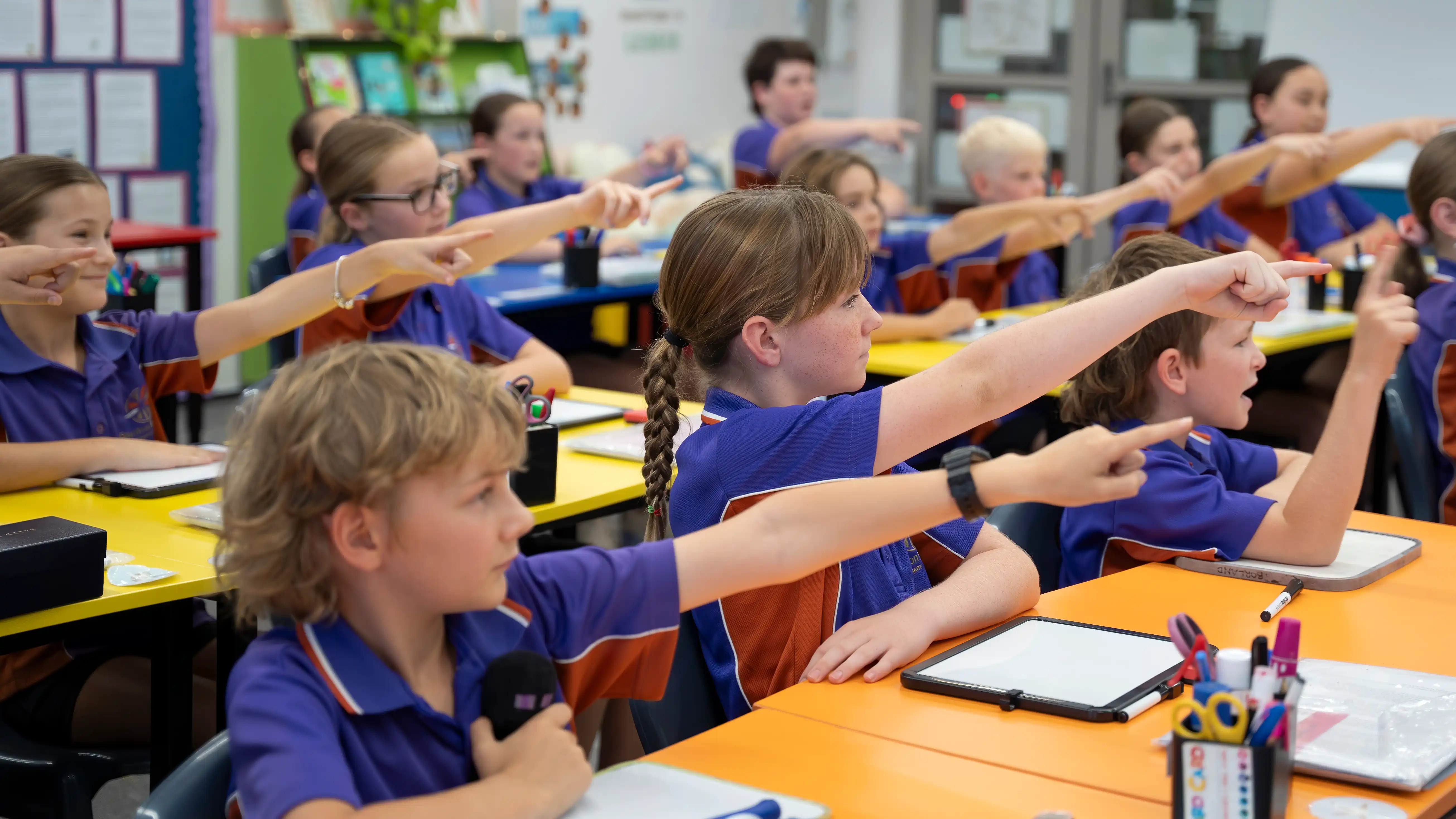 Students point forward