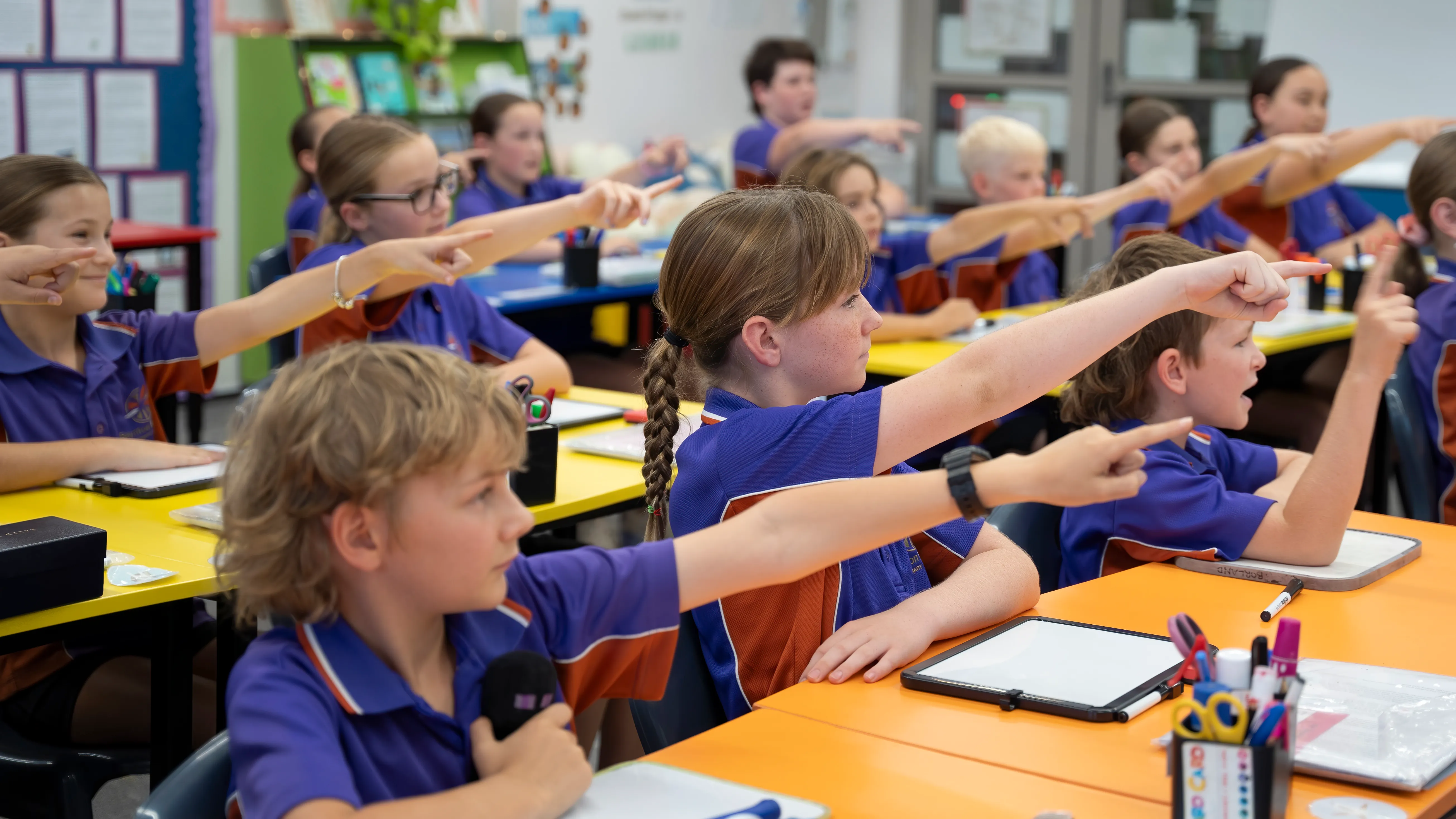 Students point forward